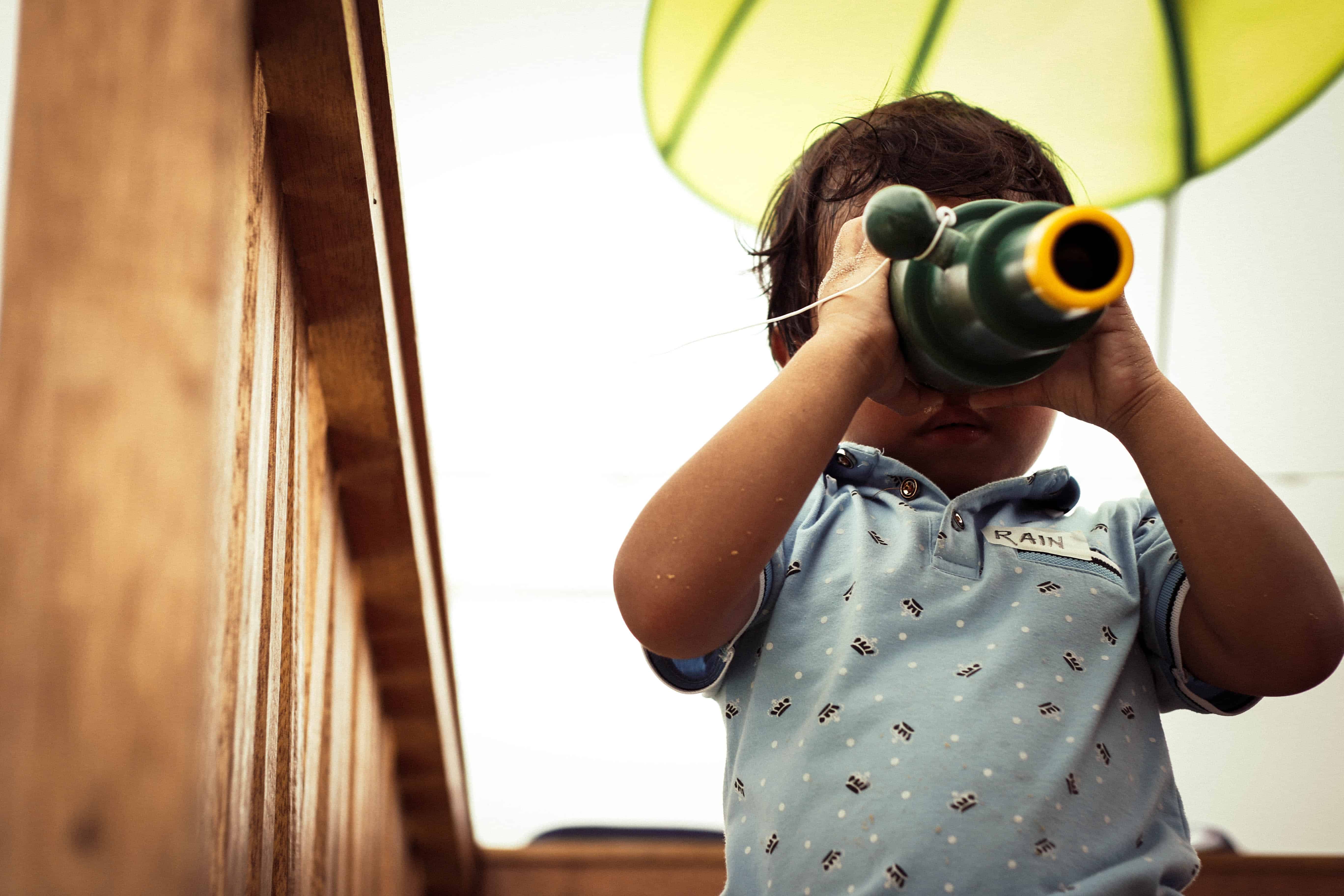 a curious boy is playing around